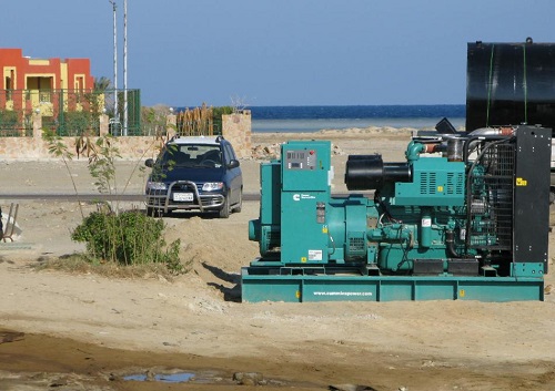 Diesel generator running at a remote off-grid construction or mining site Diesel generator running at a remote off-grid construction or mining site